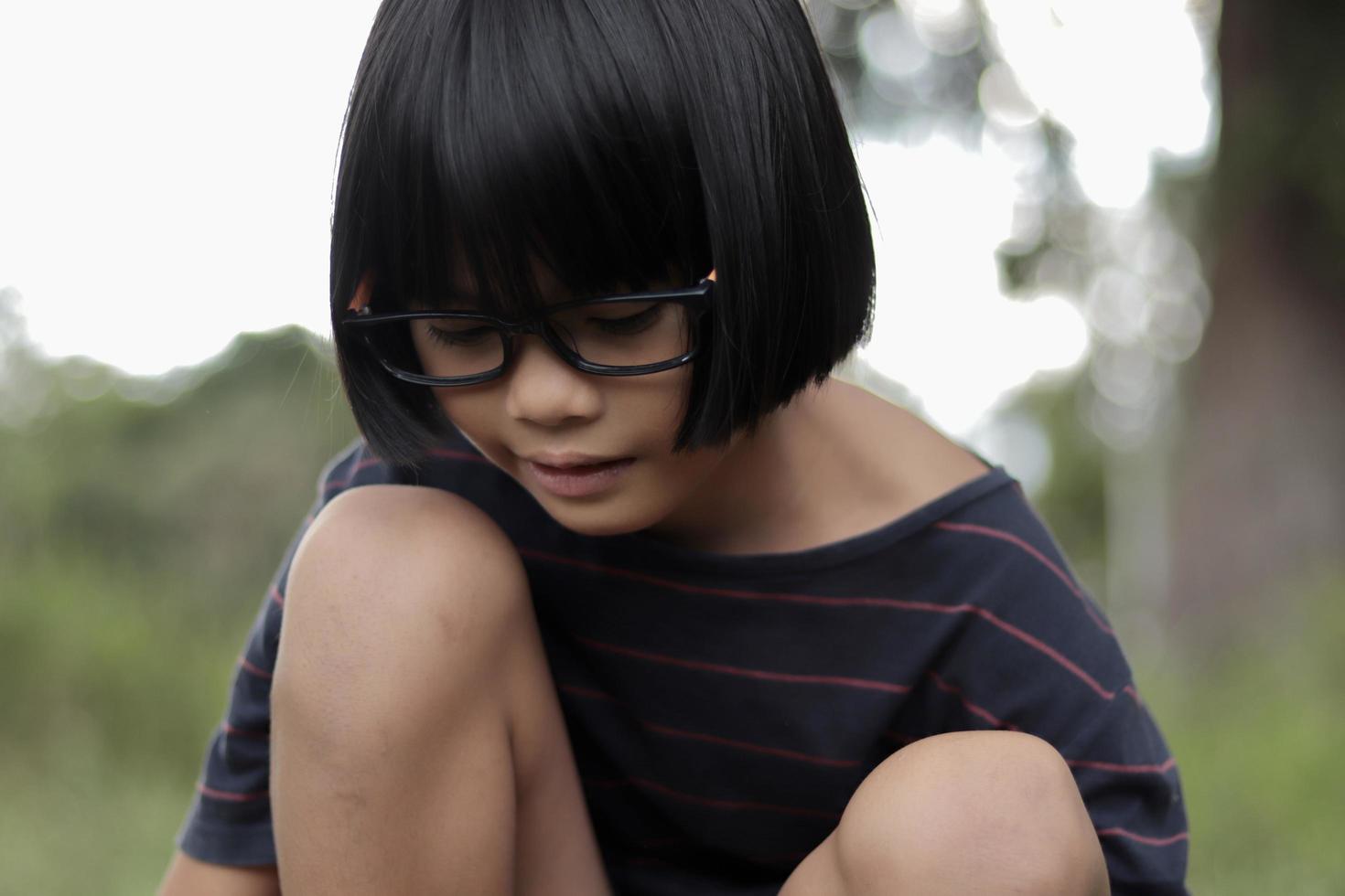 Portrait of child wearing eyeglasses photo