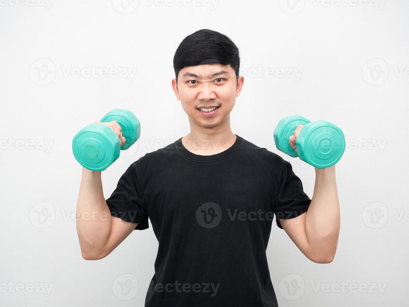 Asian man holding dumbbell for exercise confident face photo