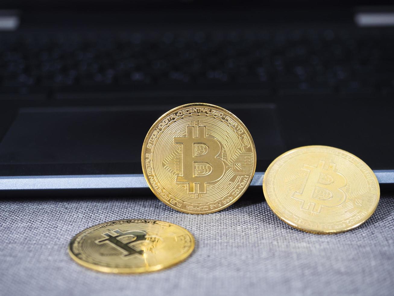 Crypto digital money gold bitcoin on keypad laptop photo