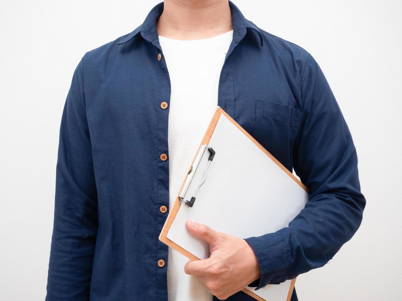 Close up man holding document board in hand crop shot photo