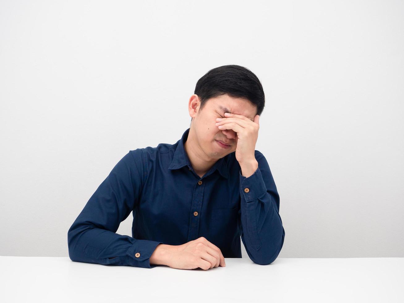 Man sitting and feeling sad emotion white background photo