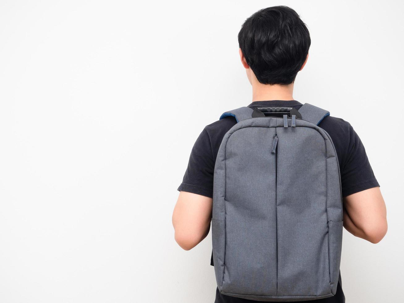hombre con soporte de mochila escolar volver copia espacio fondo blanco concepto de regreso a la escuela foto