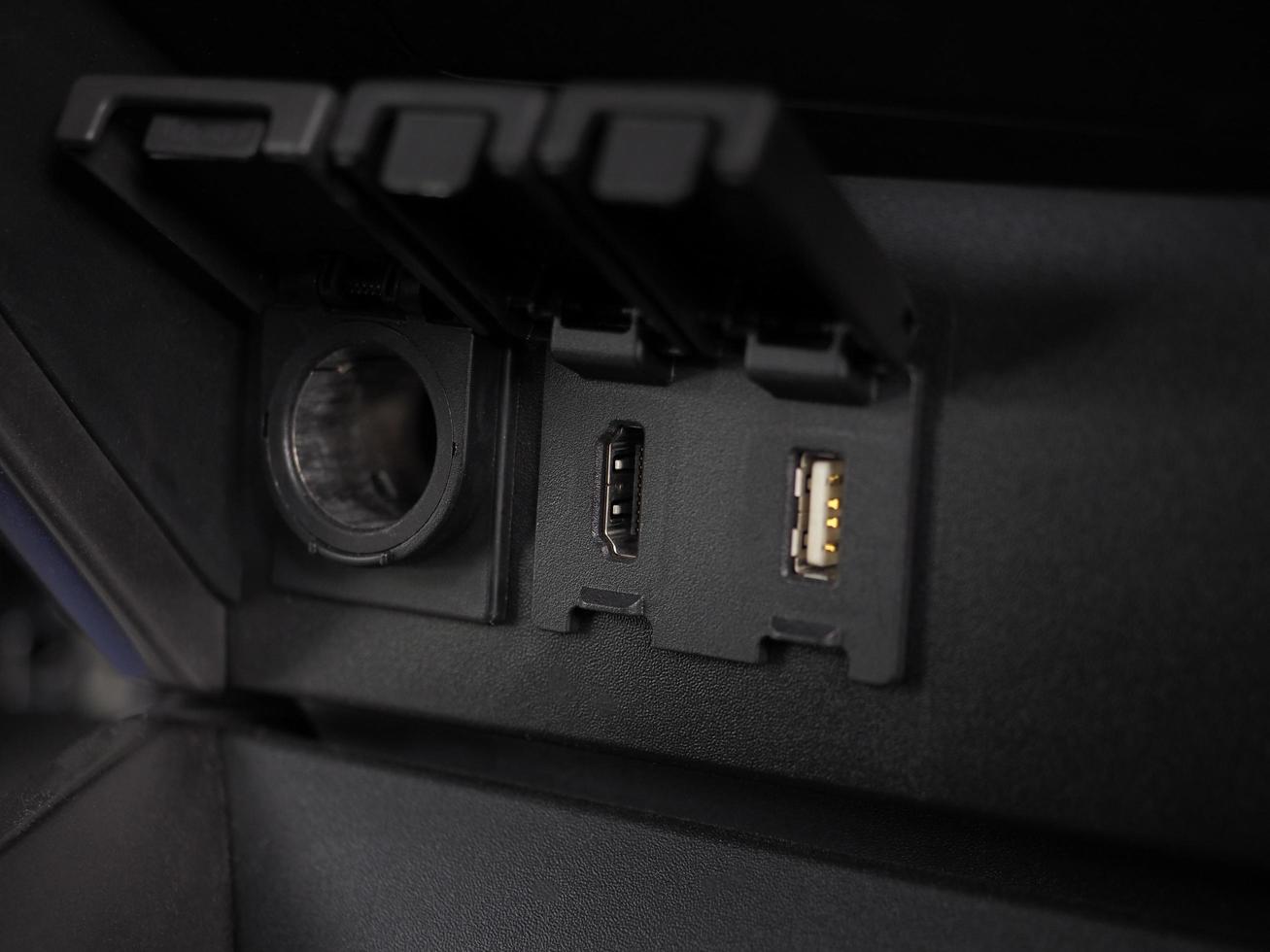 Power and HDMI and USB socket interioir the car shiny and clean photo