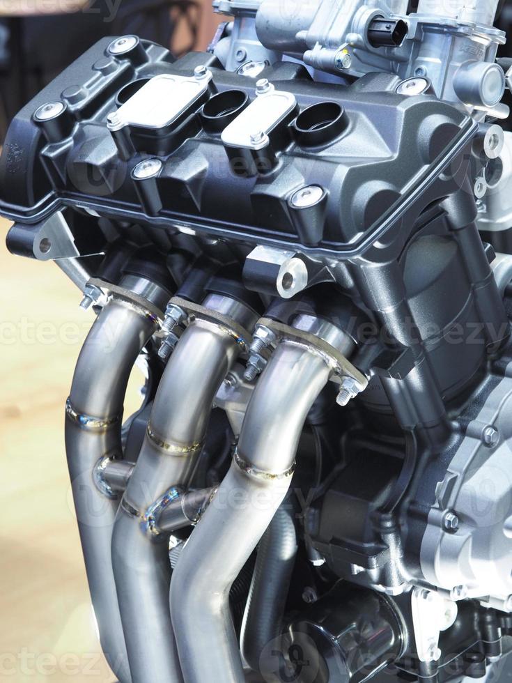 Closeup carburetor machine engine detail new and shiny of car transportation concept,The new engine detail technology photo