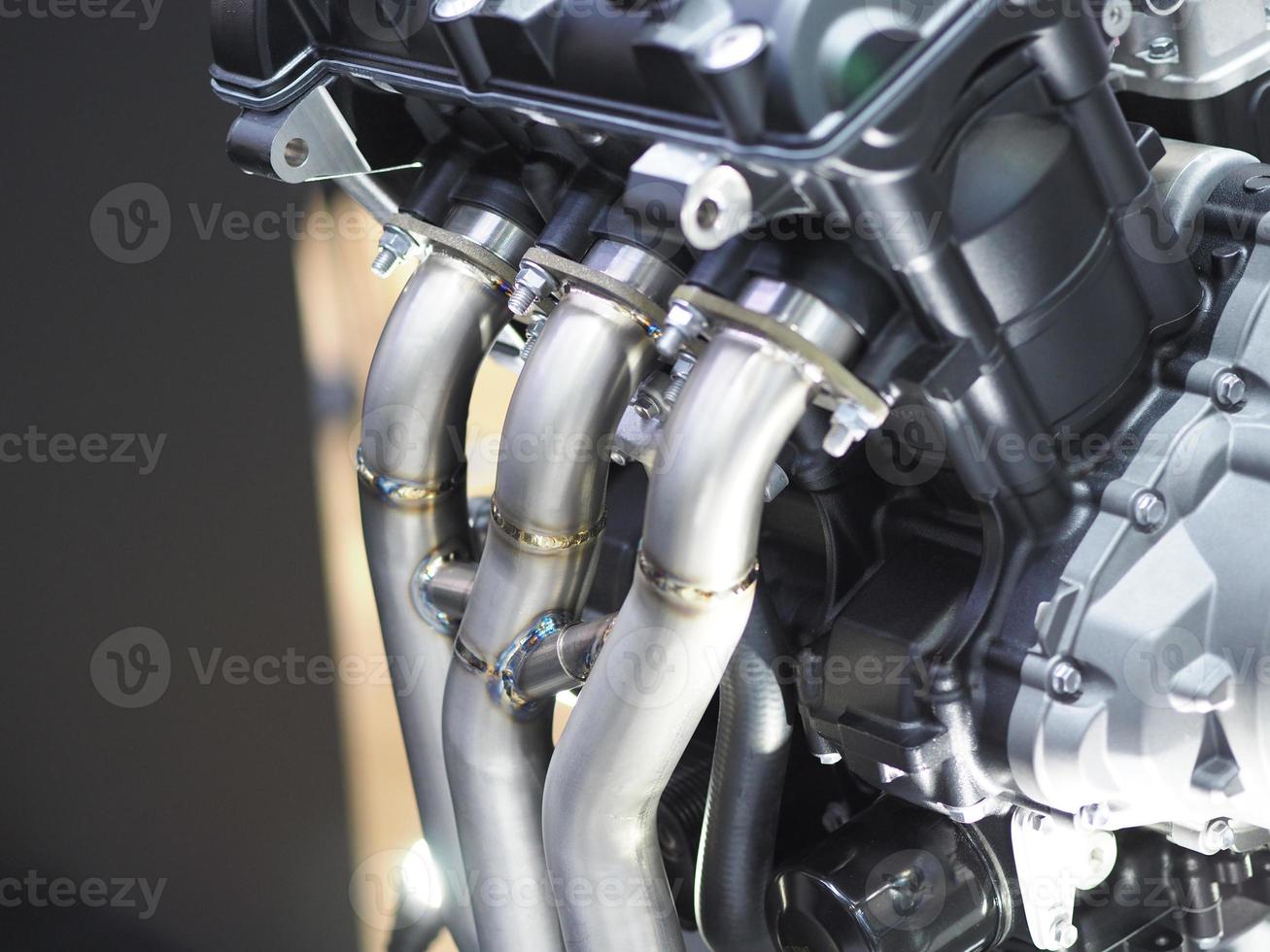 Closeup carburetor machine engine detail new and shiny of car transportation concept,The new engine detail technology photo