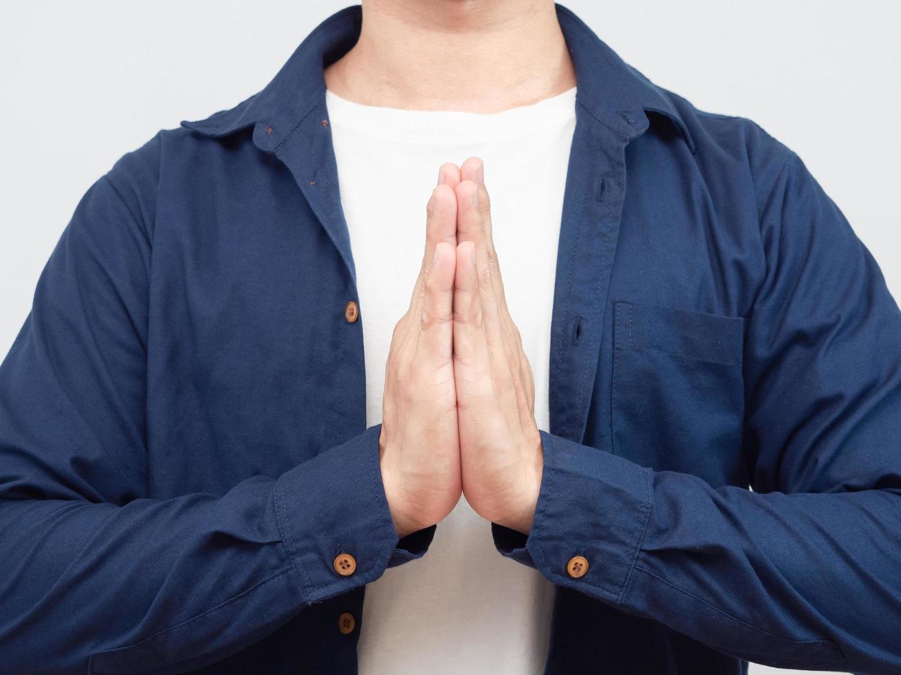 Closeup crop boy man pray respect hand portrait photo