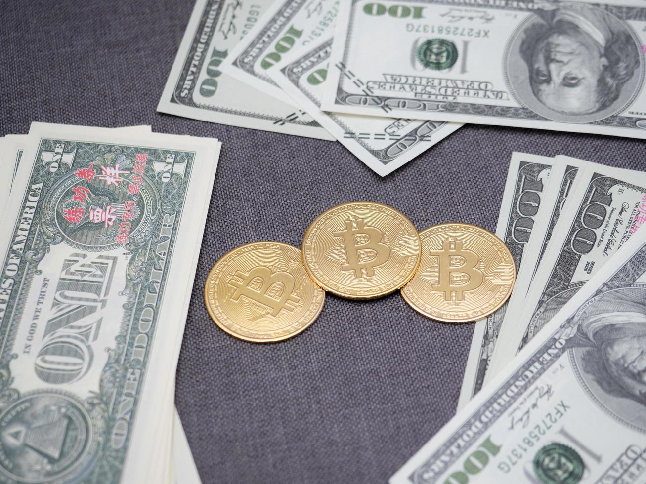 Golden bitcoin with money around digital money concept,Crypto money bitcoin with A lot of money bill photo