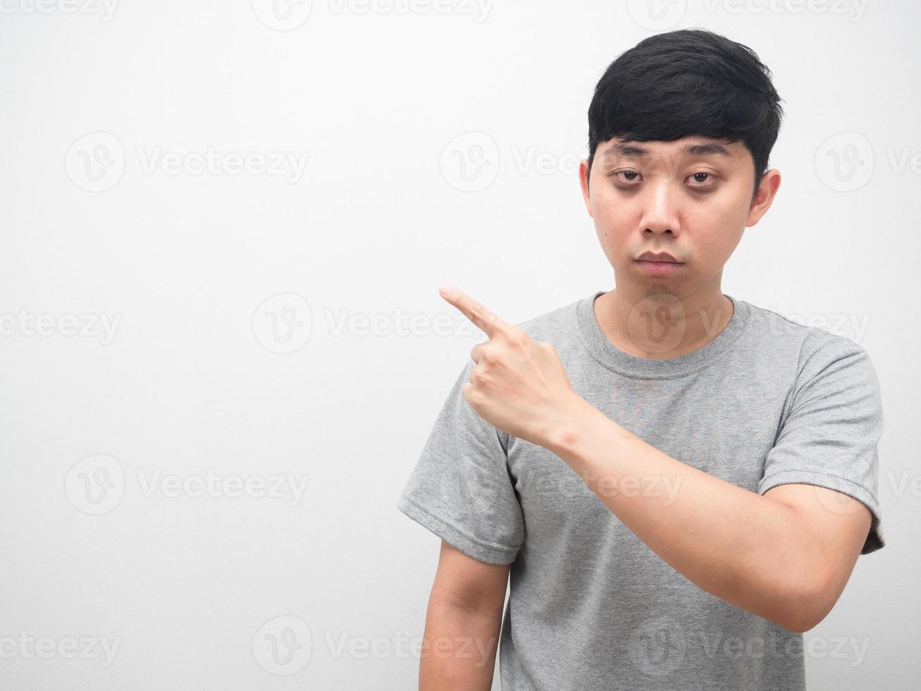 Man sleepless feel tried point finger at copy space photo