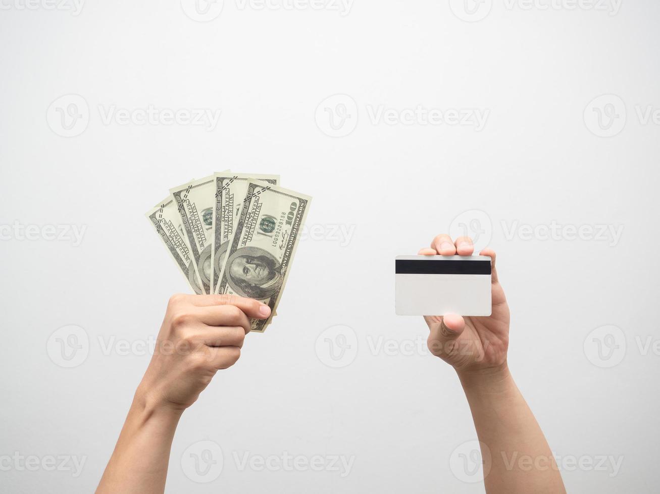 Isolated hand holding money dollar and credit card photo