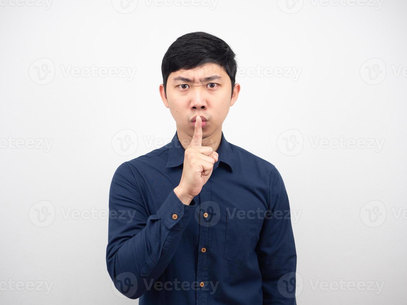 Asian man gesture shush serious face slient concept white background photo