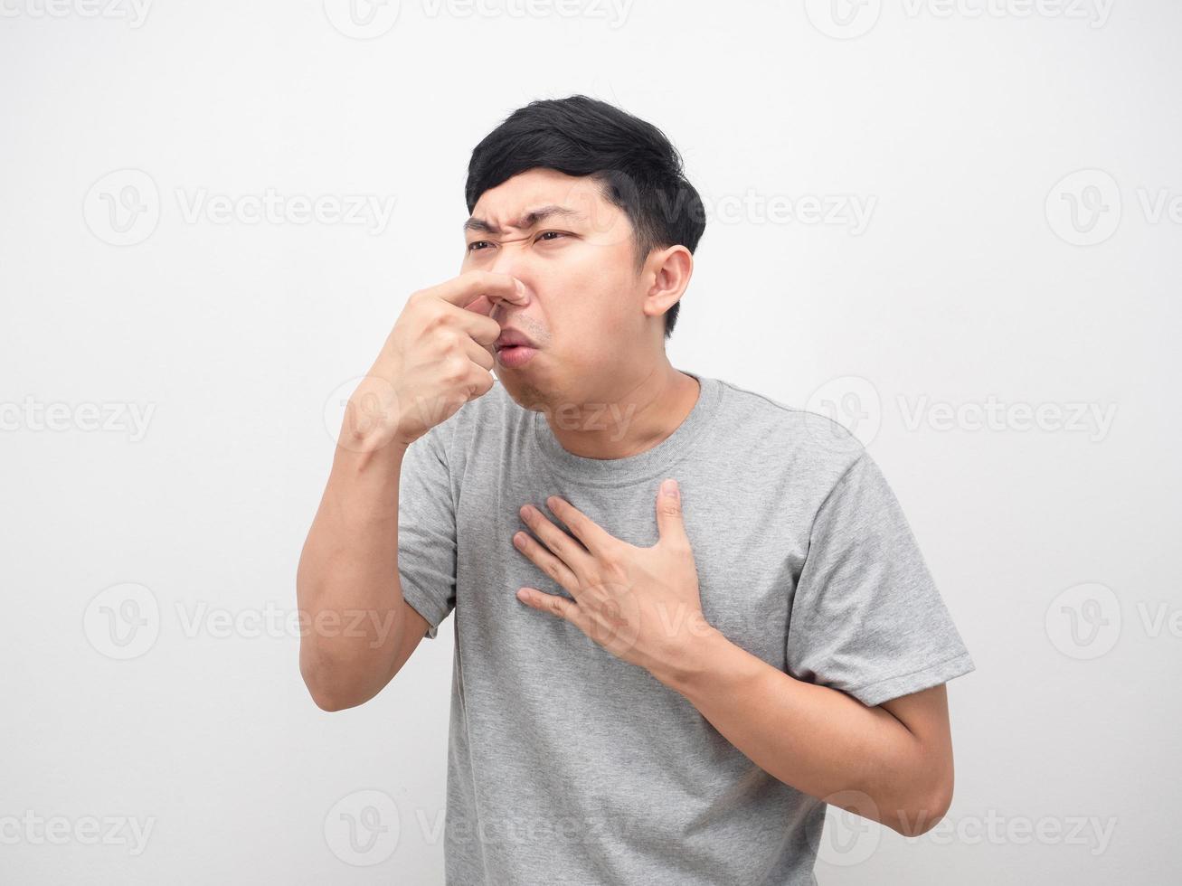 Man close his nose feeling vomit white background photo