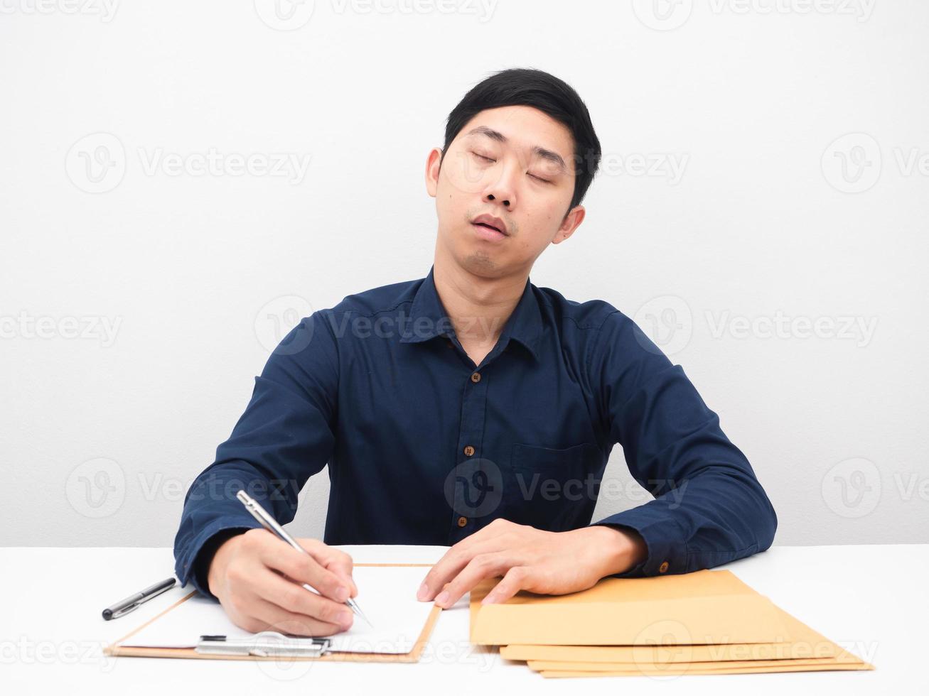 Man sleep with document envolope on the table photo