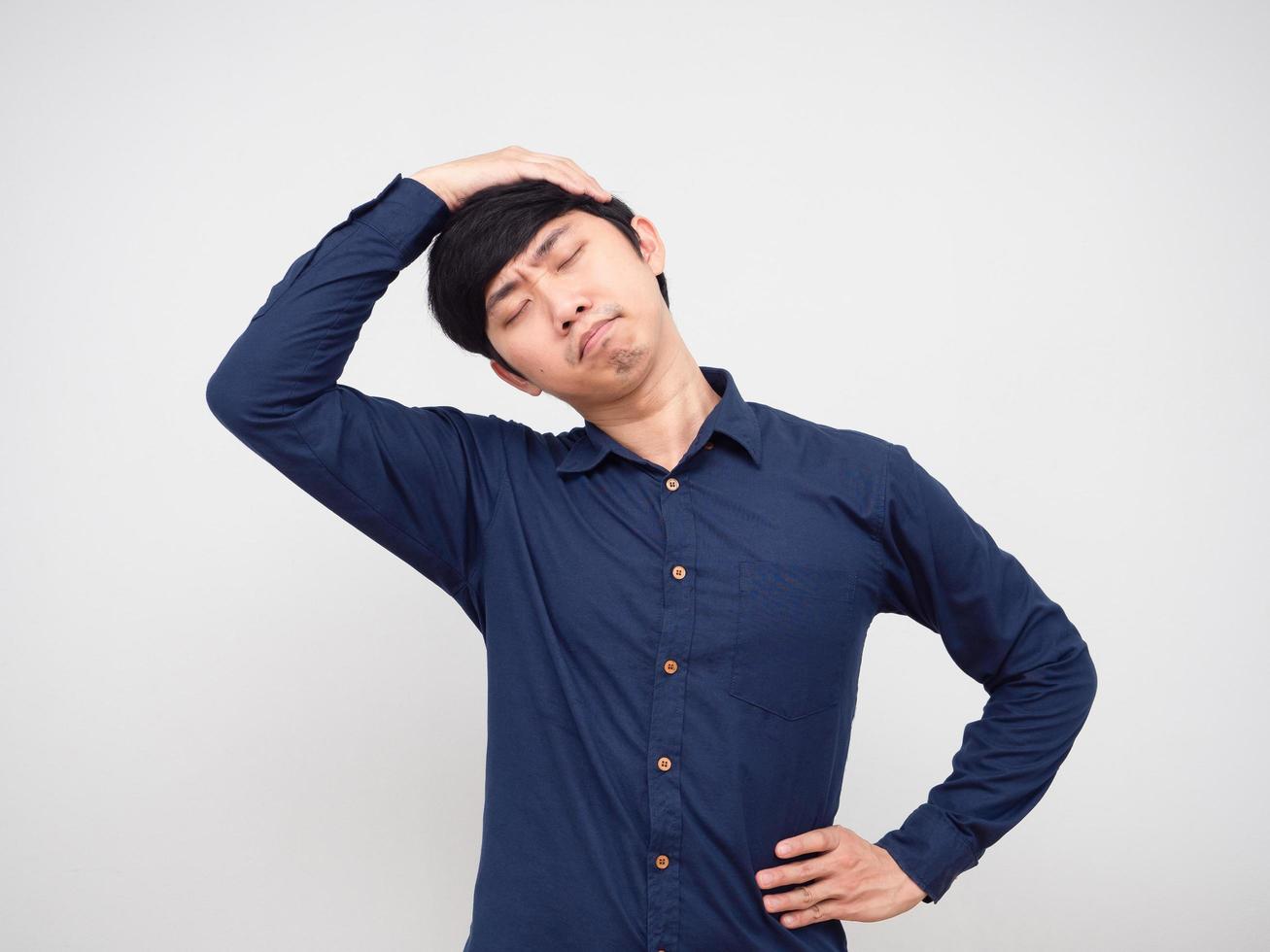 Asian man feeling lazy stretch oneself portrait white background photo