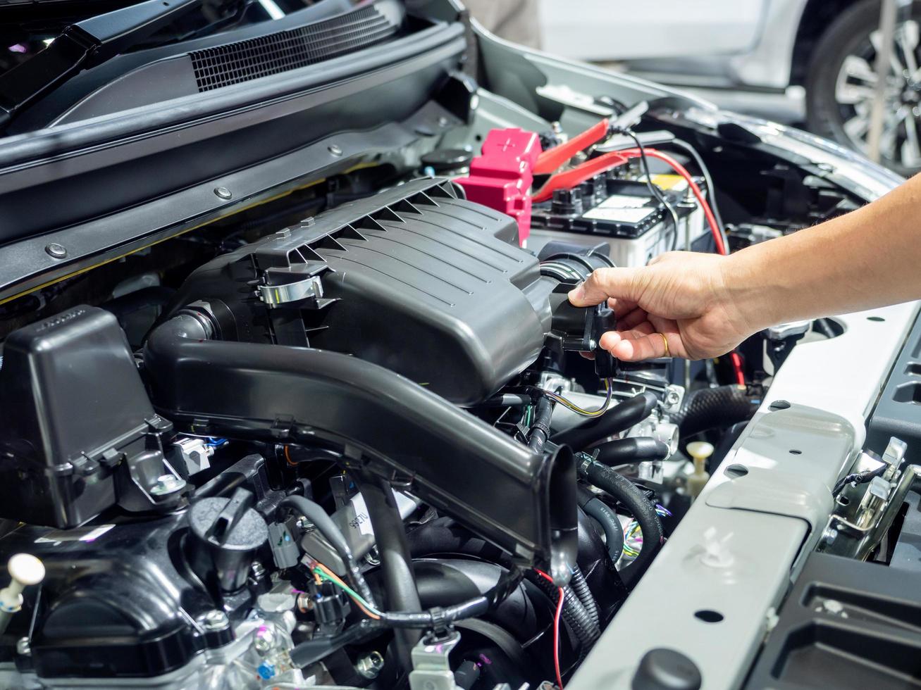 Hand touch and cheking engine interioir new car shuny and clear photo