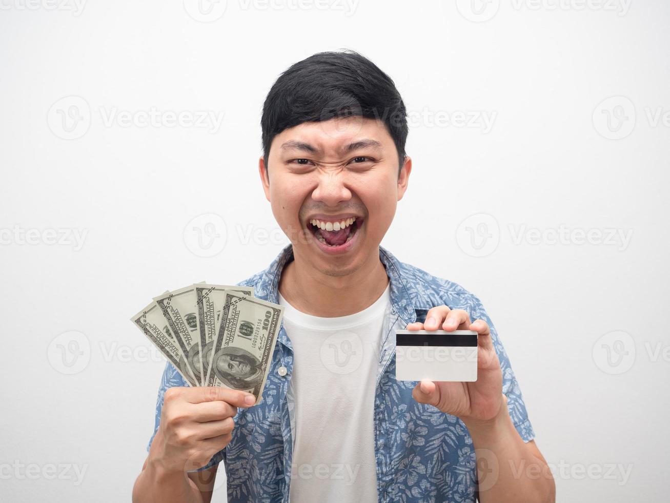 Portrait man showing money and credit card in hand smiling face feel happy photo