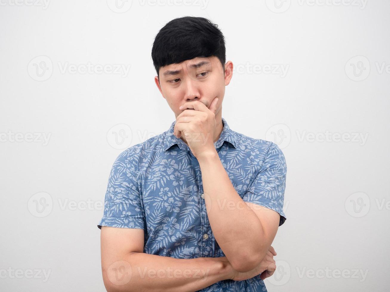Man blue shirt sad emotion hand close his mouth and crying photo