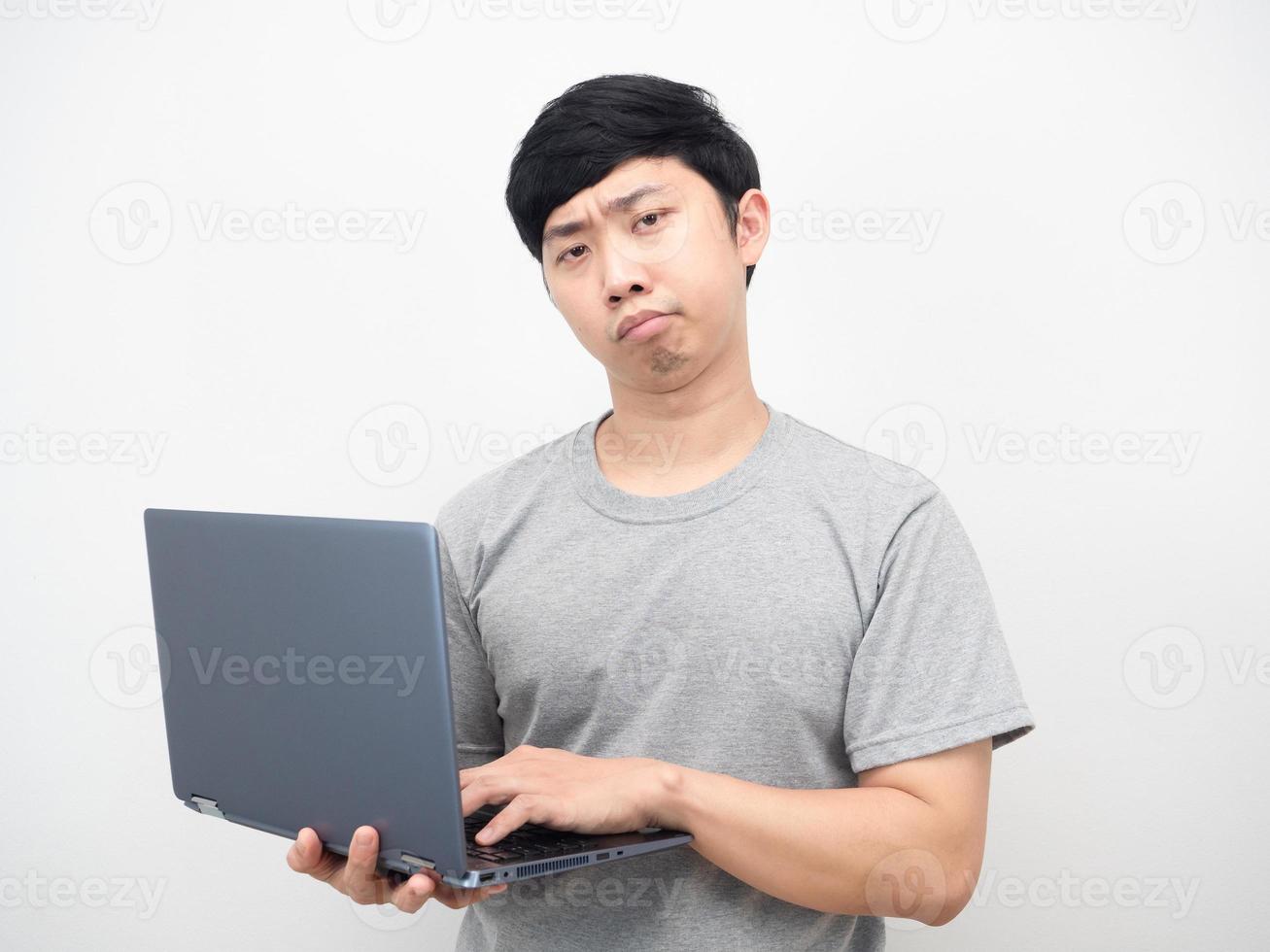 Asian man using strain emotion looking at camera photo