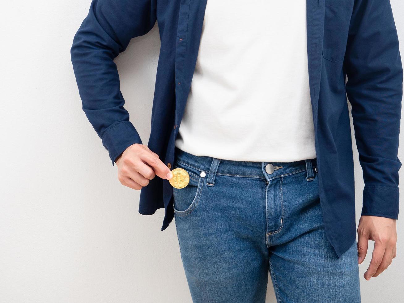 Closeup man pick up money from jean pocket on white background digital money concept photo