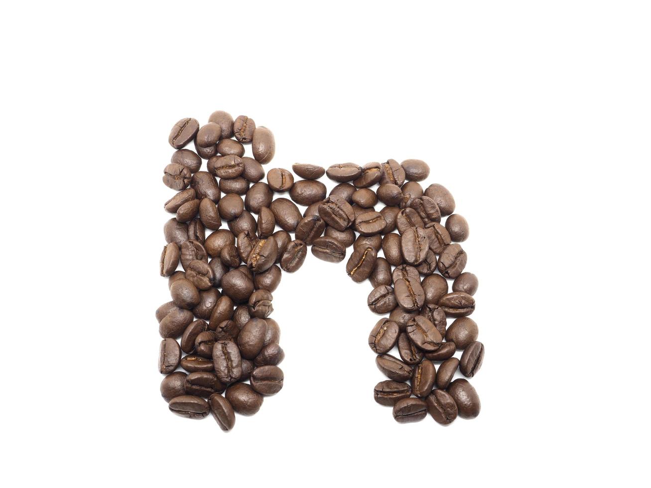 Coffee seed word 'n' on white isolated photo