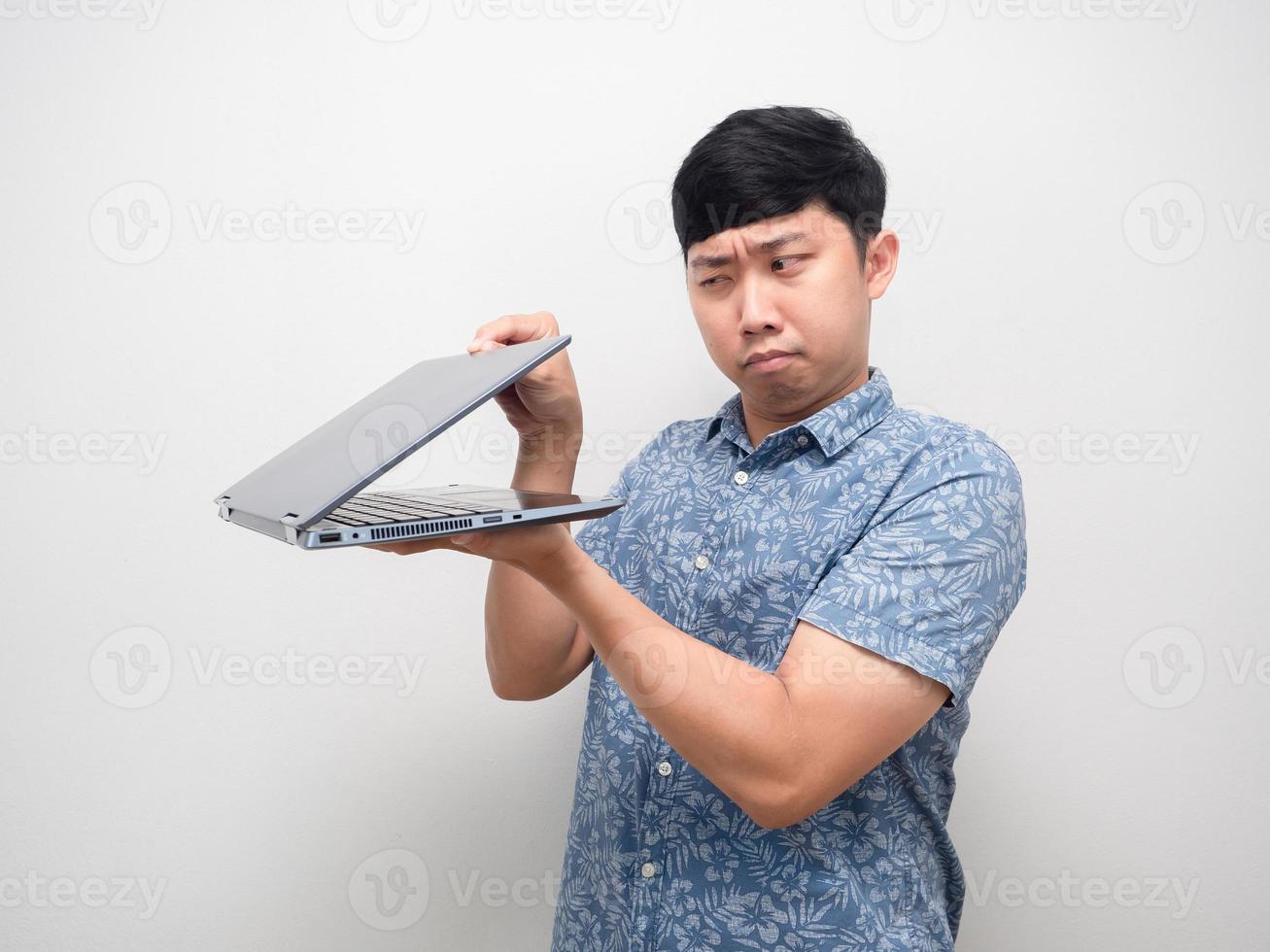 Man blue shirt half open laptop in hand gesture spying and feel afraid content photo