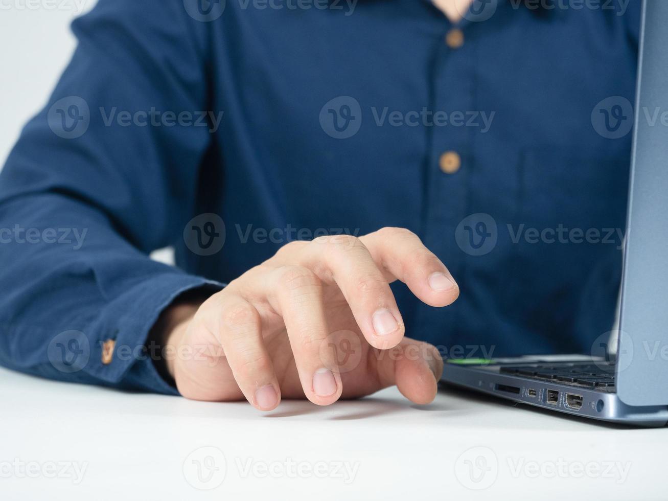 Close up man hand empty with laptop on the table photo