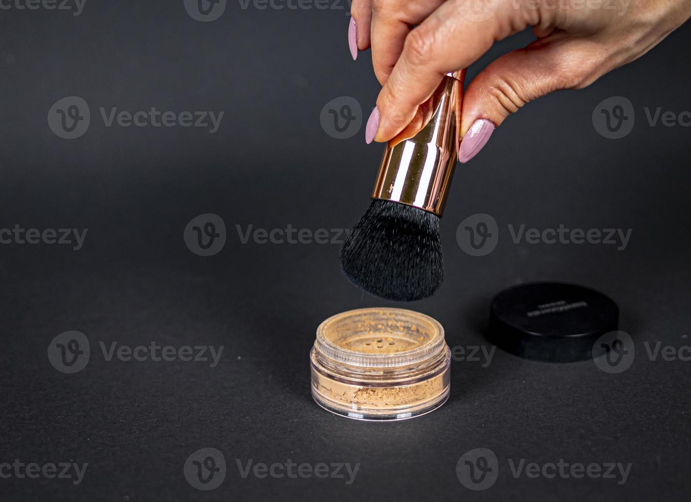 A brush for applying foundation for the face. Elite level cosmetics. A series of shots. Part-10 photo
