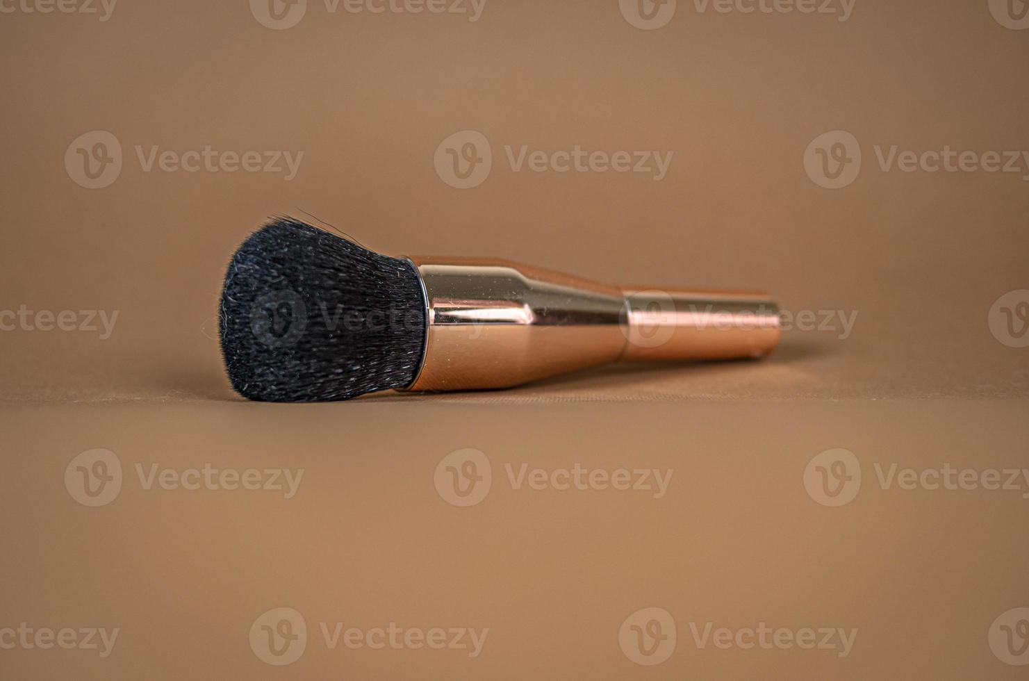 A brush for applying foundation for the face. Elite level cosmetics. A series of shots. Part-7 photo