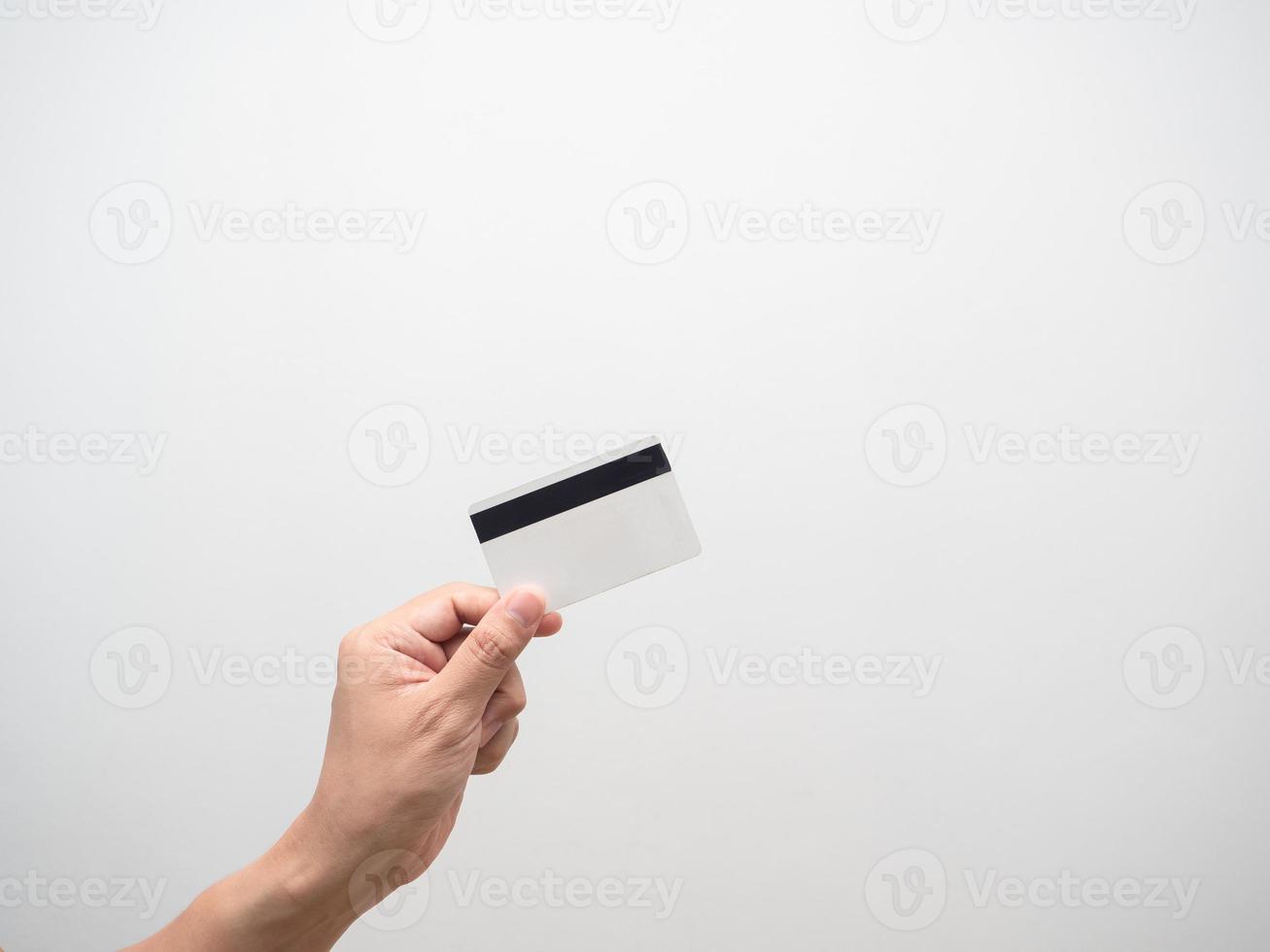 Close up hand holding credit card isolated photo