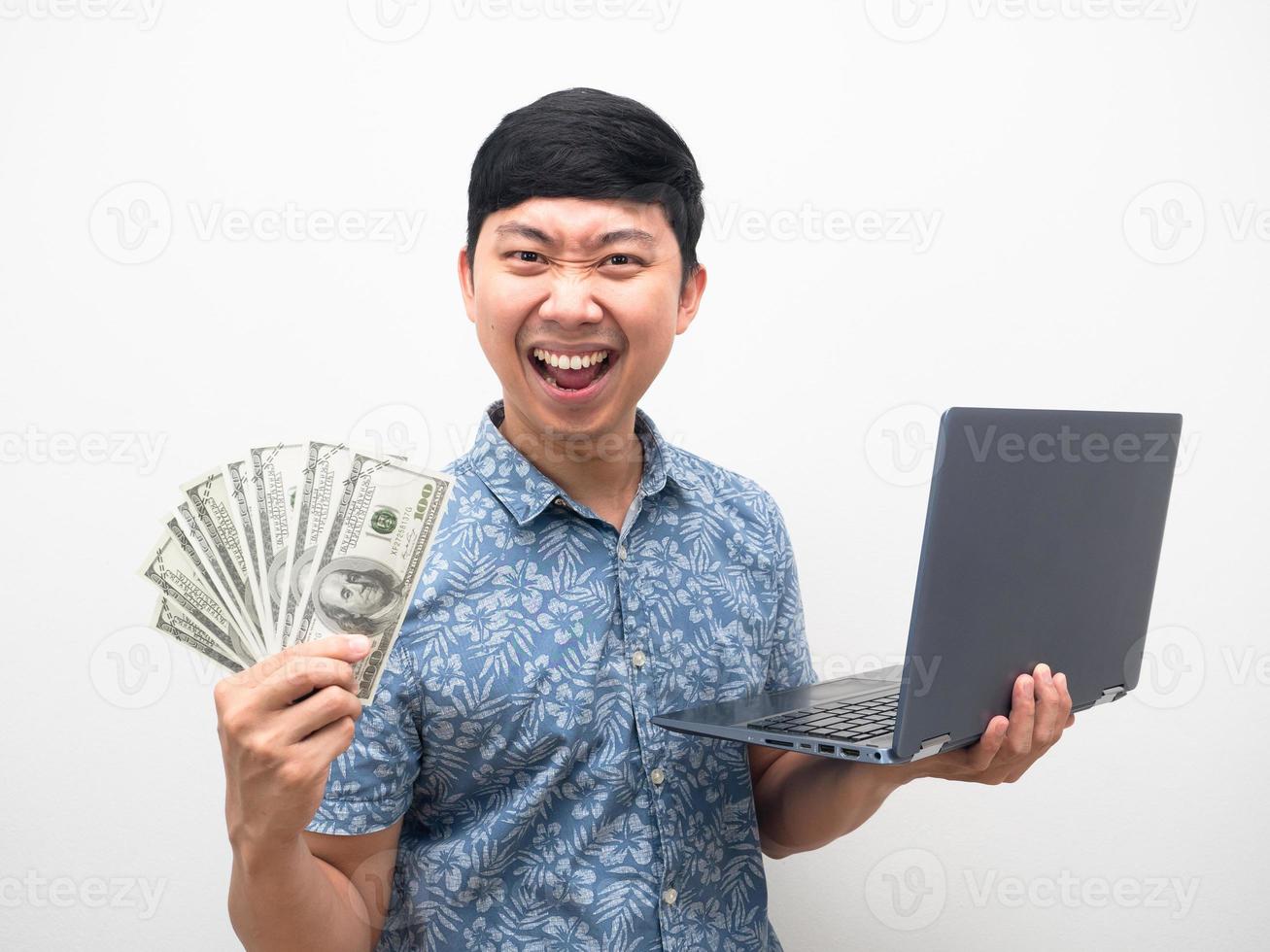 Man blue shirt get a lot of money with online working feel satisfy and happy showing money photo