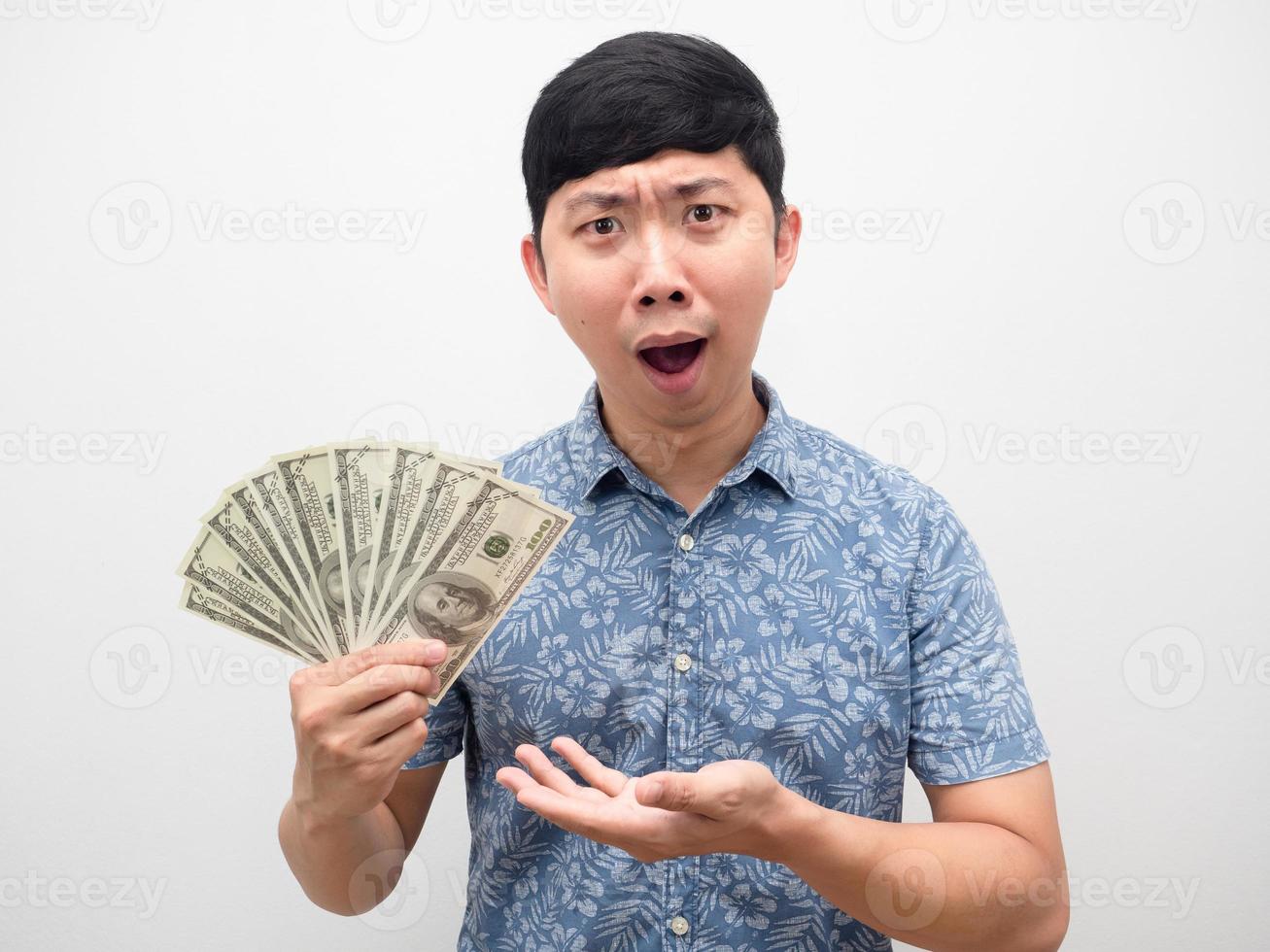 Man blue shirt excited show money in hand portrait photo