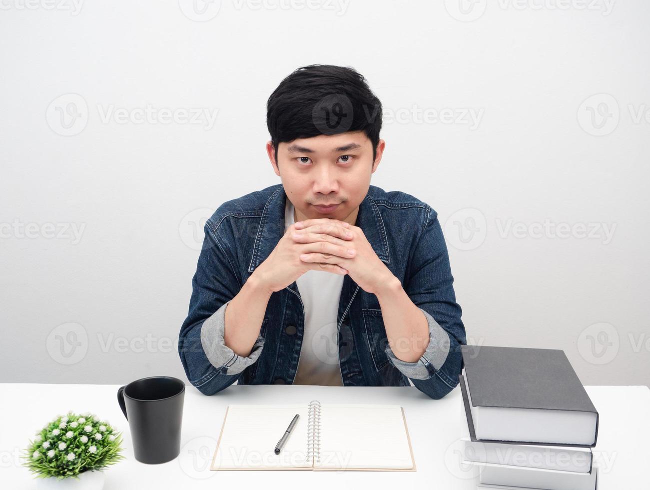 Man sit at workplace desk joy hand confident looking at camera photo