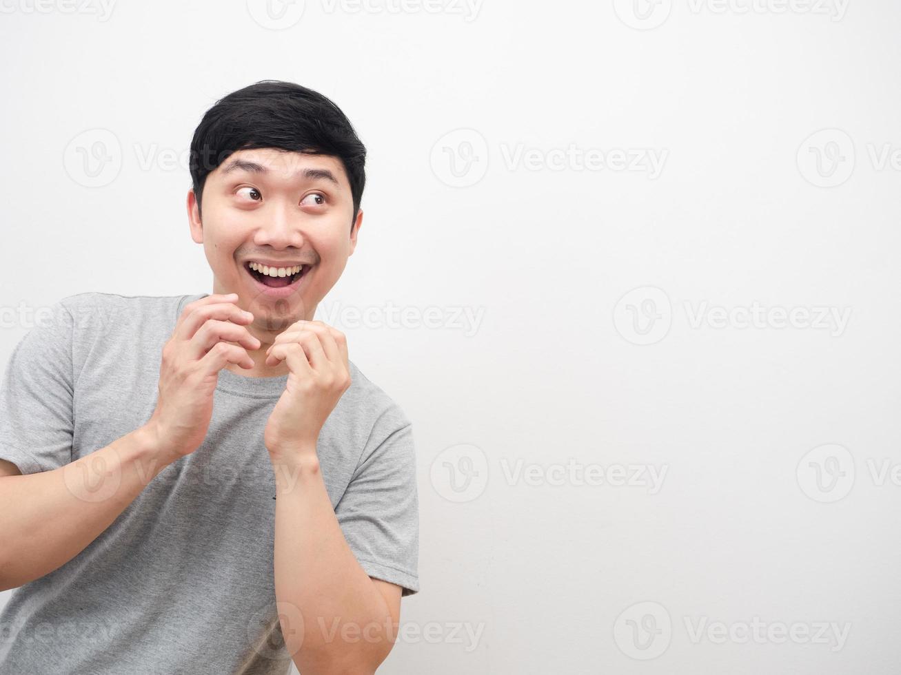 Asian man happy emotion looking at copy space white isolated photo