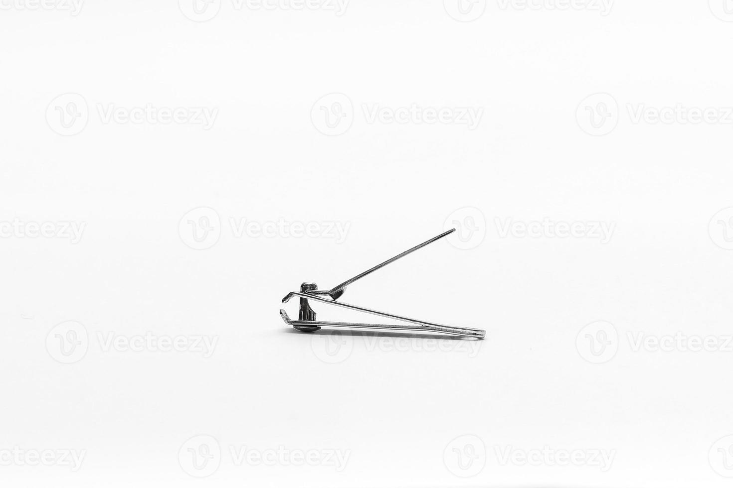 Cosmetic tweezers isolated on white background. Nail care illustration for good hygiene. photo
