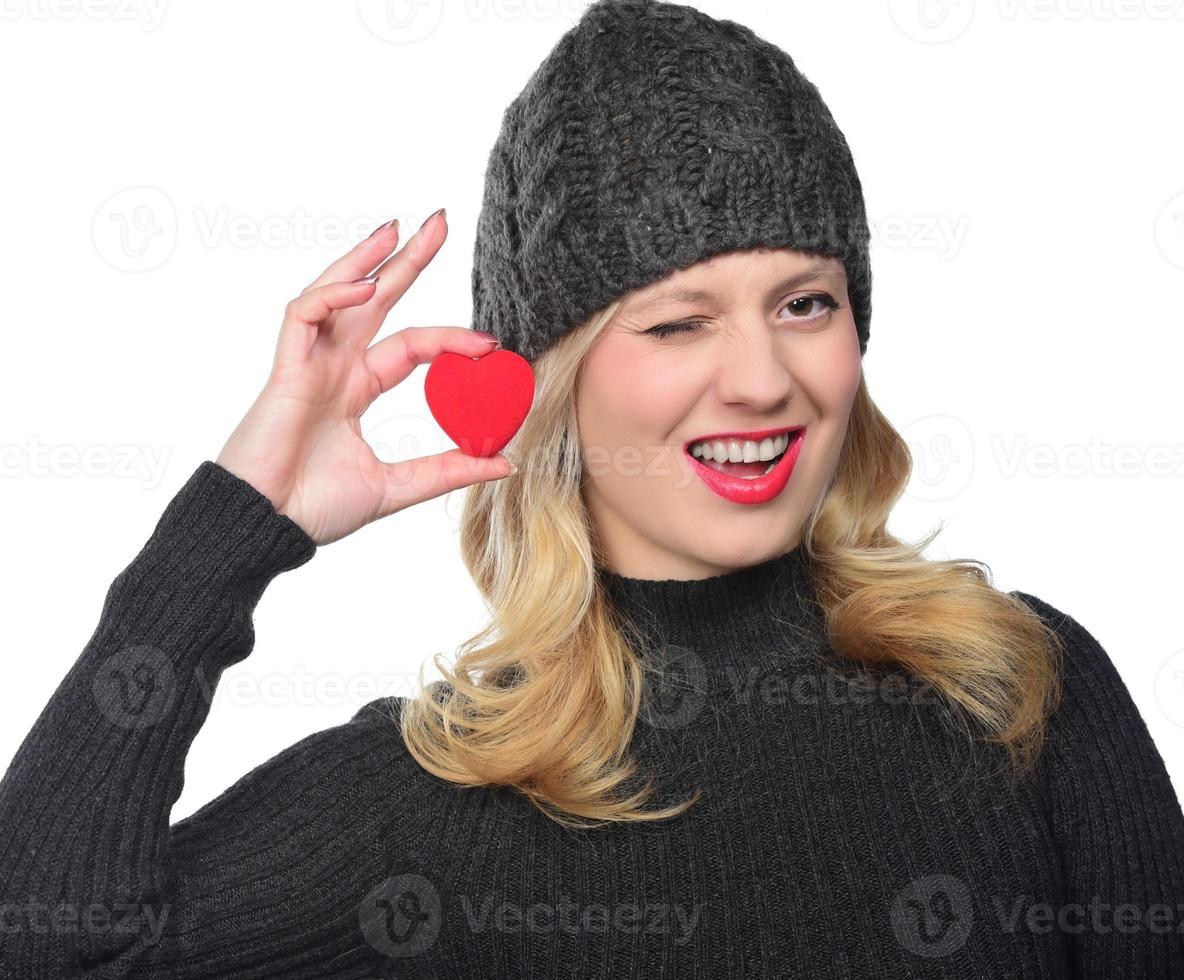 Cute attractive young woman with red heart. Valentine's day art portrait. photo