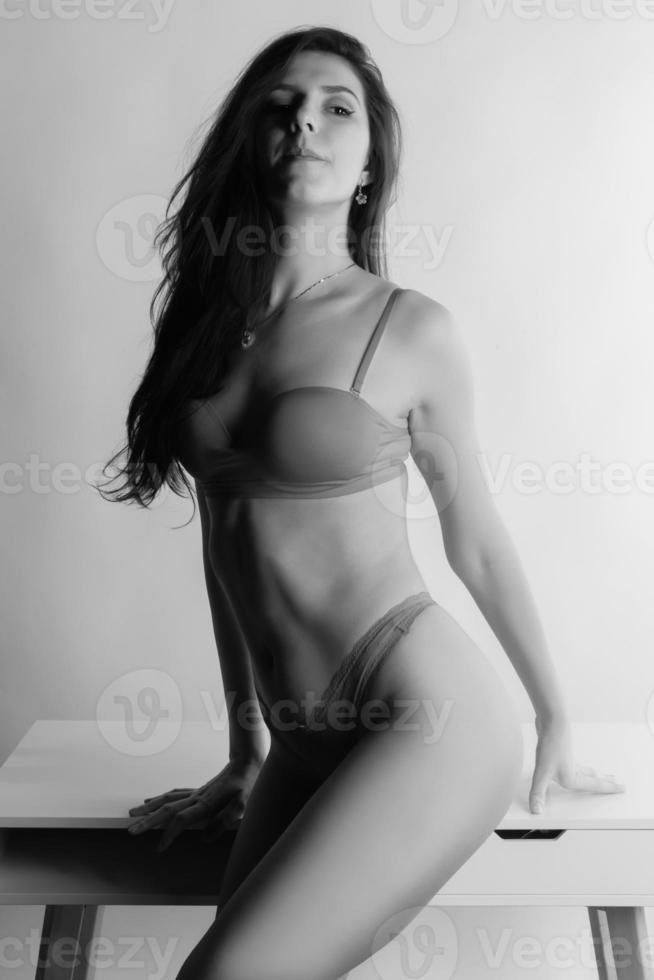 Sexy beautiful brunette woman in sensual lingerie photo