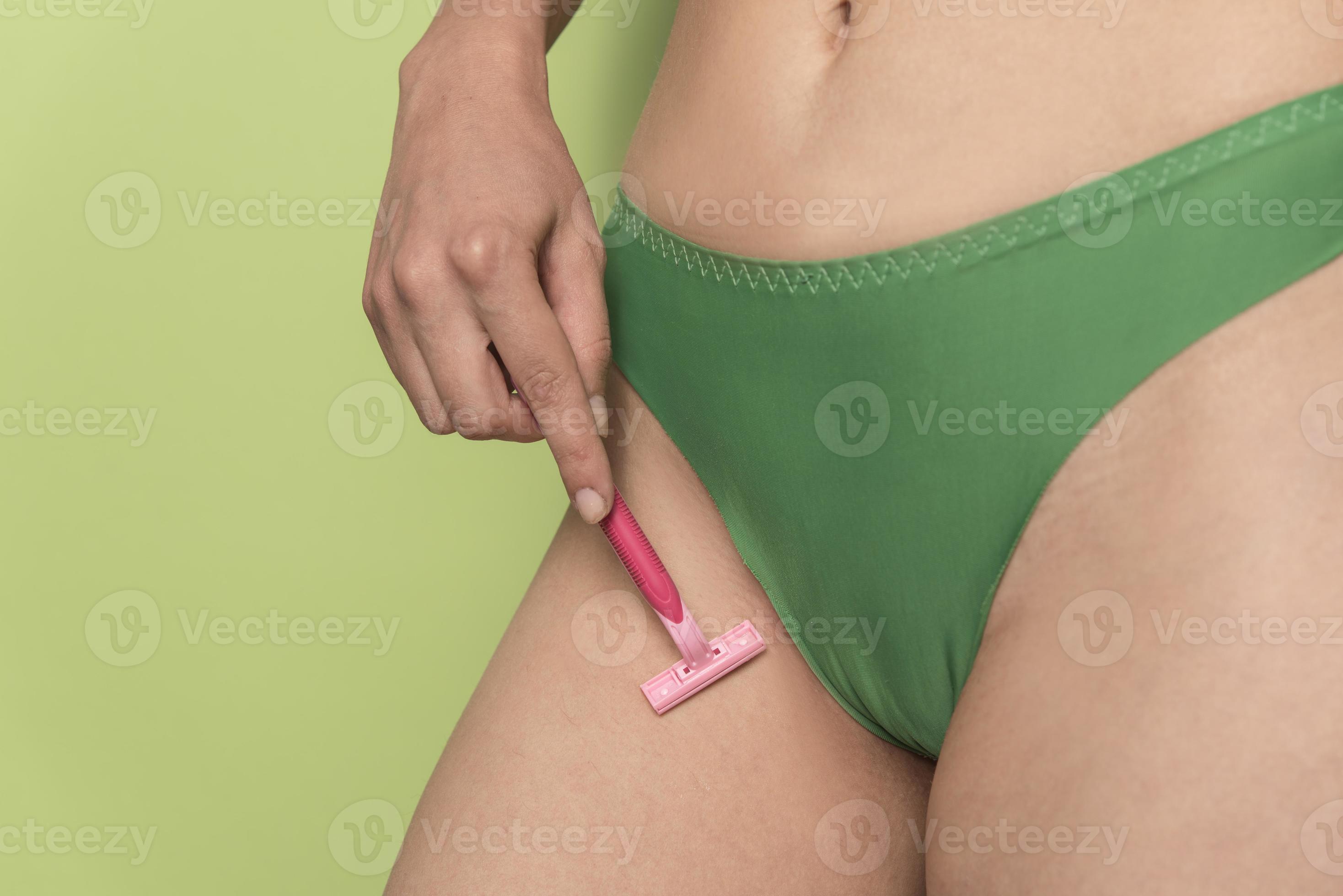 woman in panties shaved her crotch with razor 16690406 Stock Photo at  Vecteezy