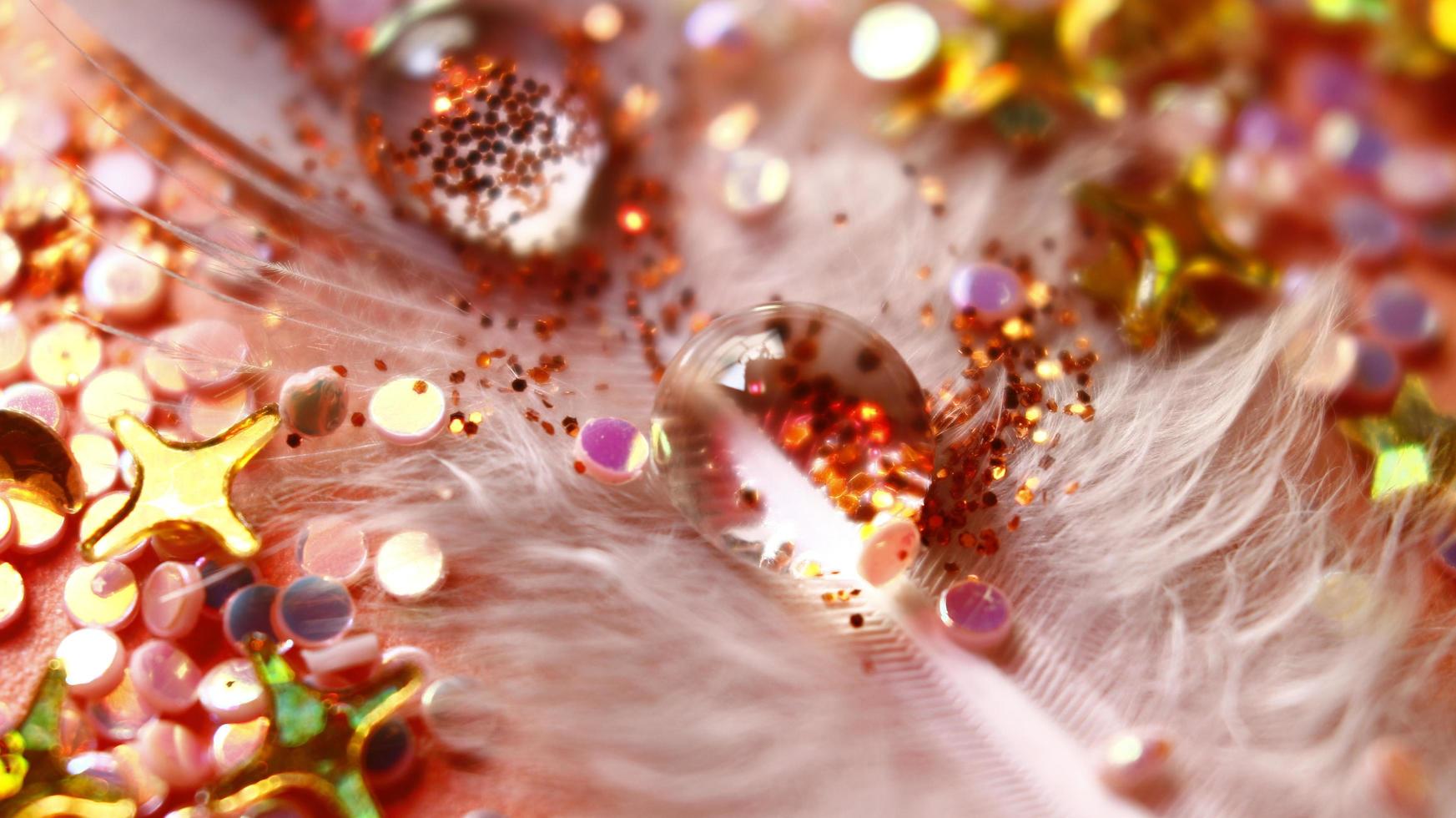 Close-up Of water drop with glitter on it in different colorful loghts in Karachi Pakistan 2022 photo