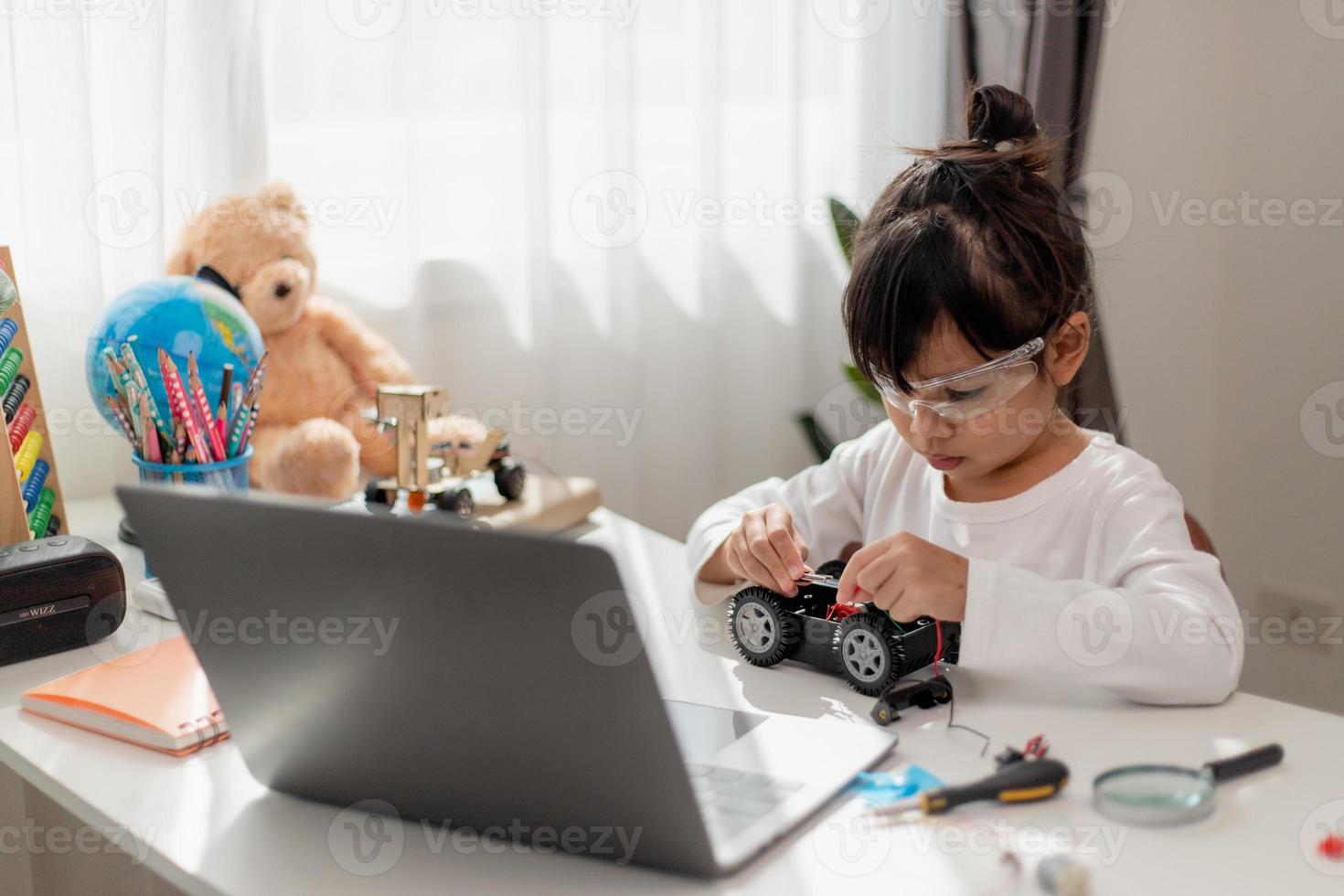 Asia students learn at home in coding robot cars and electronic board ...