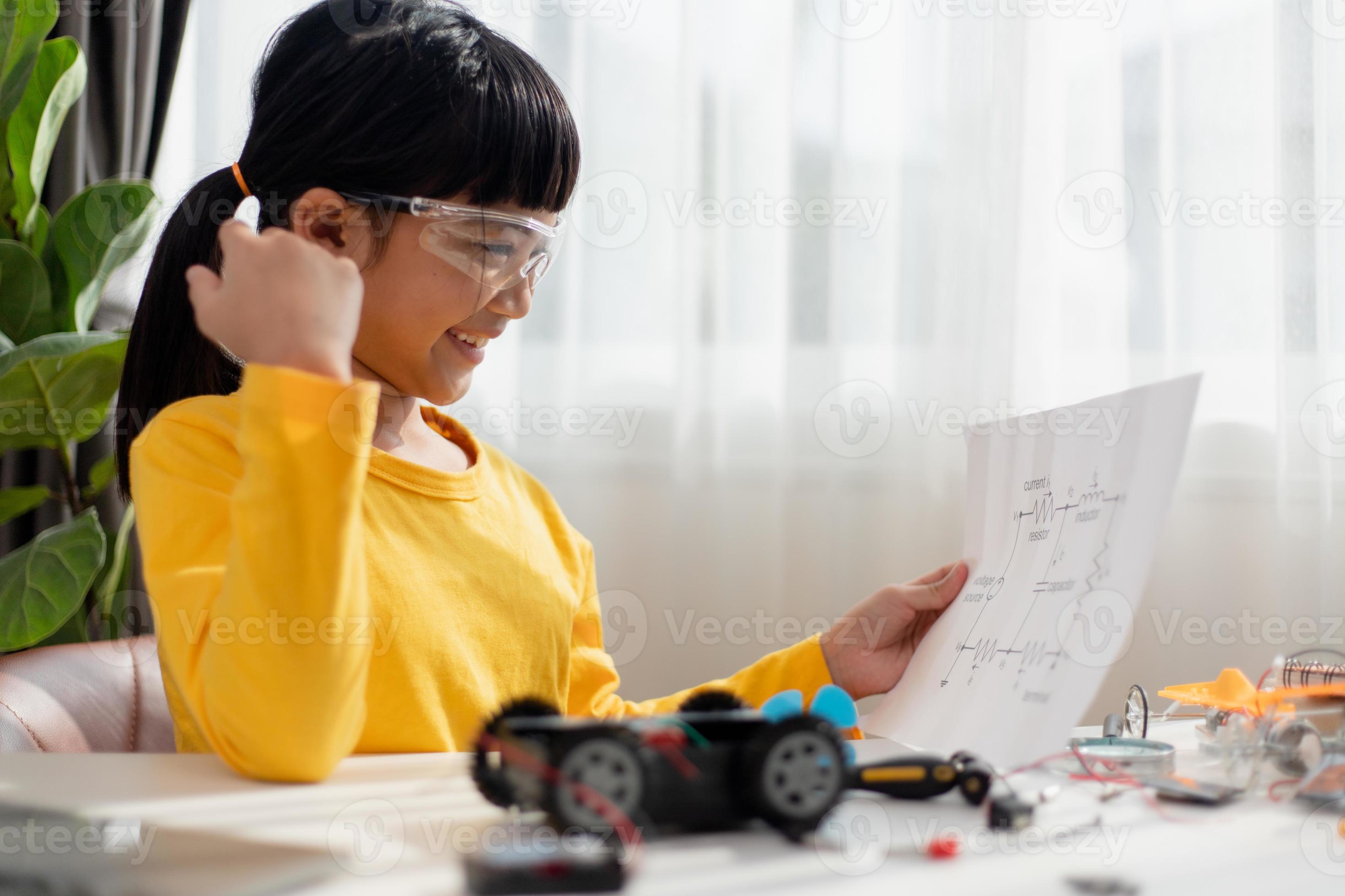 Asia students learn at home in coding robot cars and electronic board ...