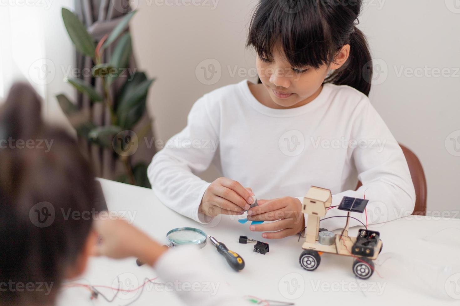 Asia students learn at home in coding robot cars and electronic board ...