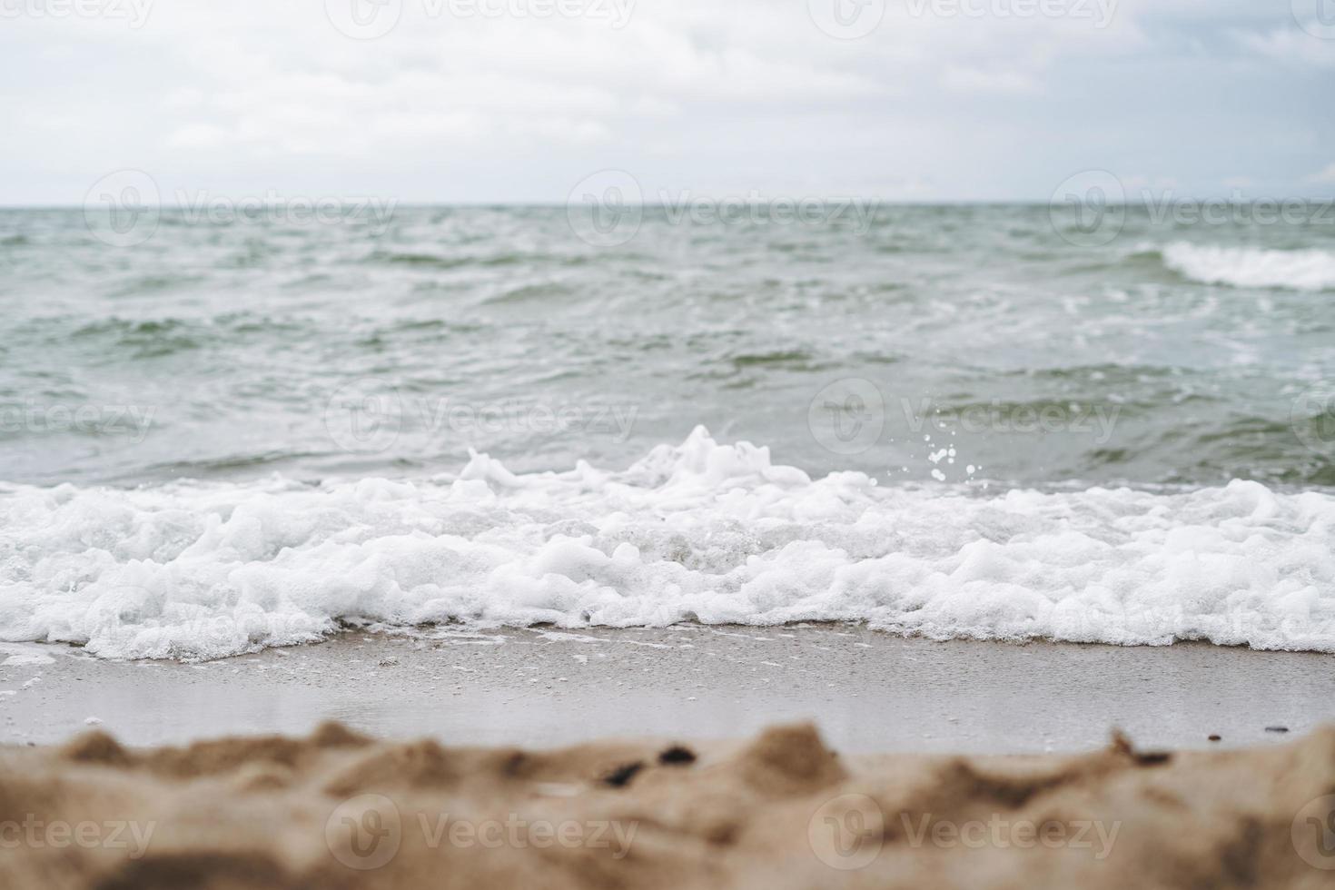 Sand beach on Baltic sea in a storm photo