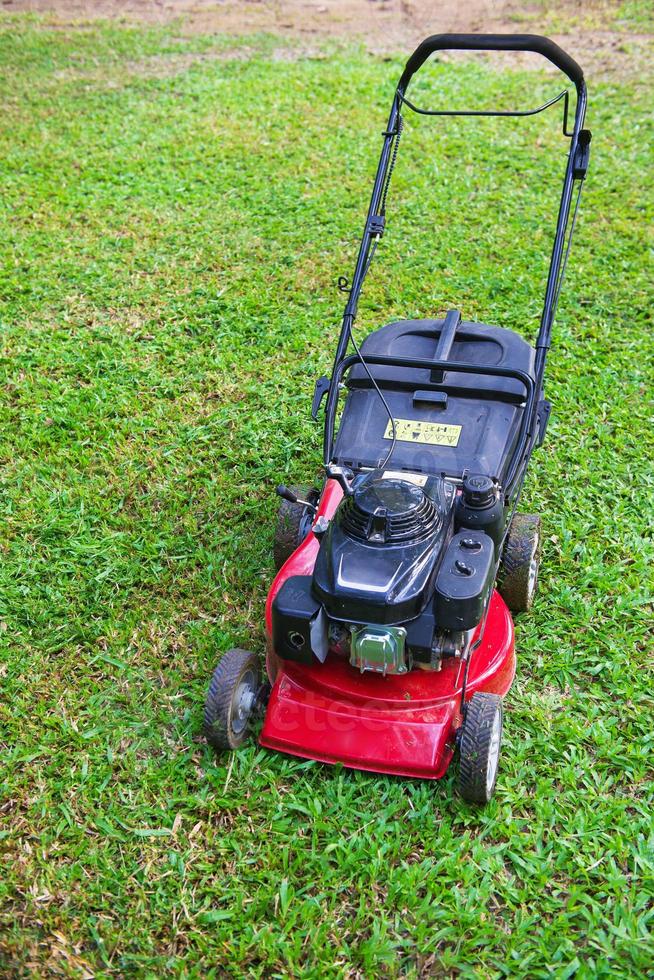 lawnmower on green grass photo