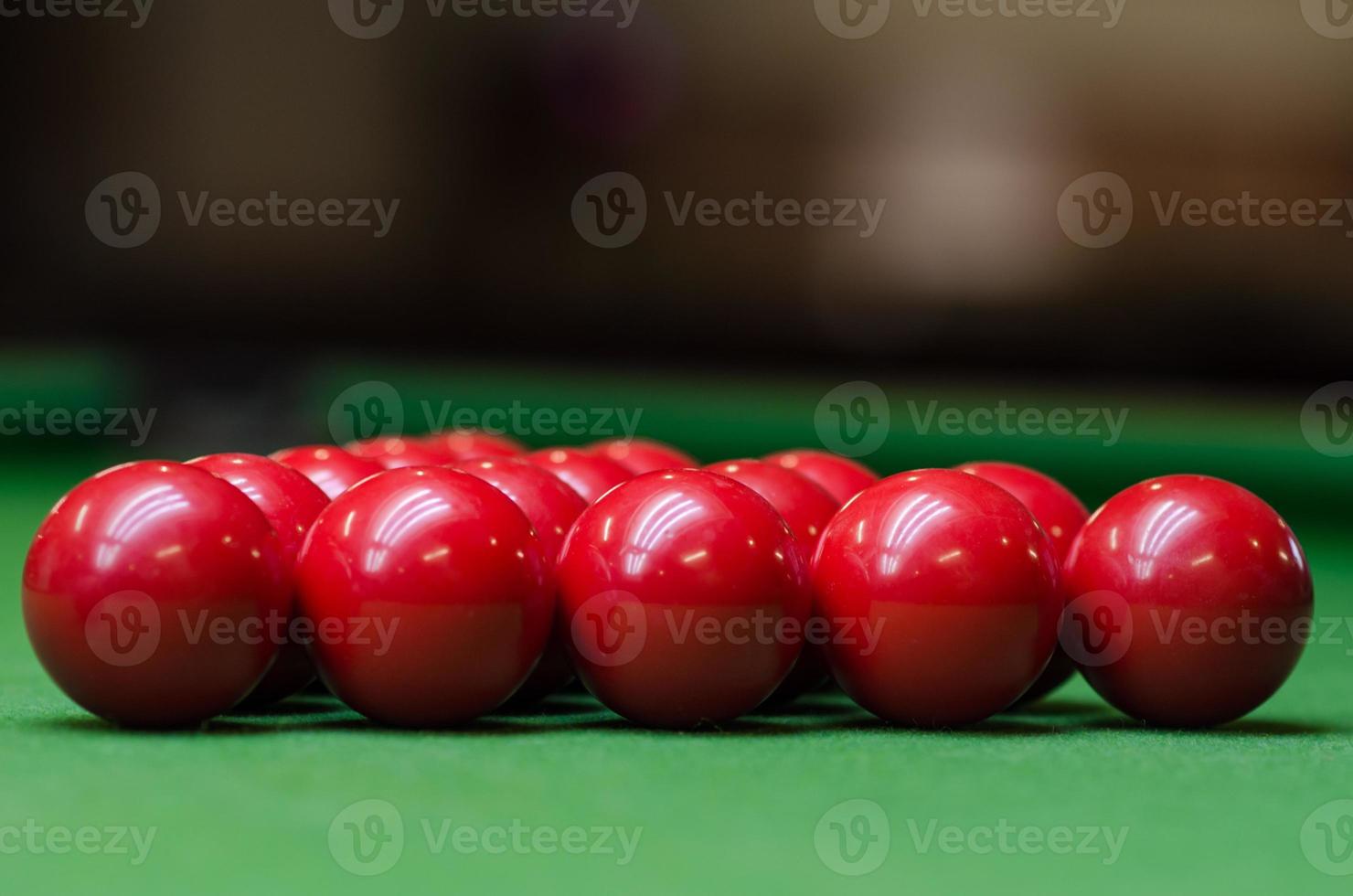 A group of red snooker balls photo