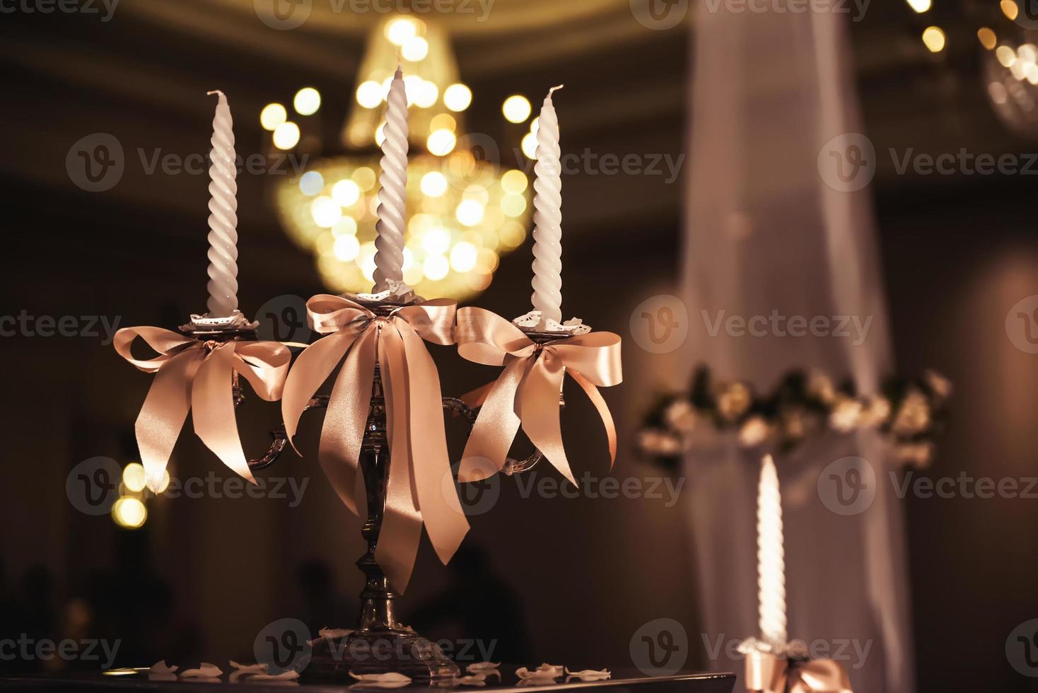 candlesticks with candles in ballroom photo