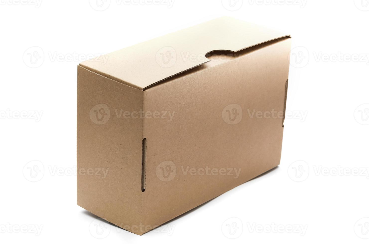 Closed empty cardboard box isolated on a white background photo