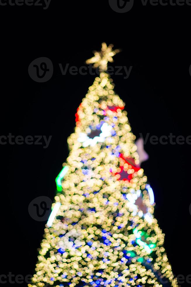 Blurry Christmas tree and decorations and lights photo