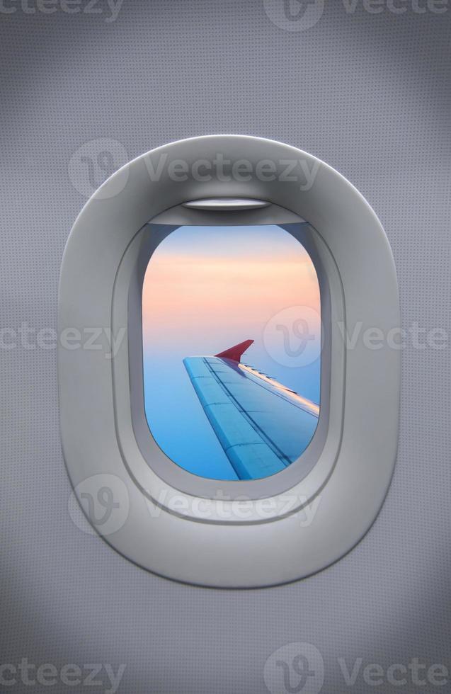 Porthole of airplane photo