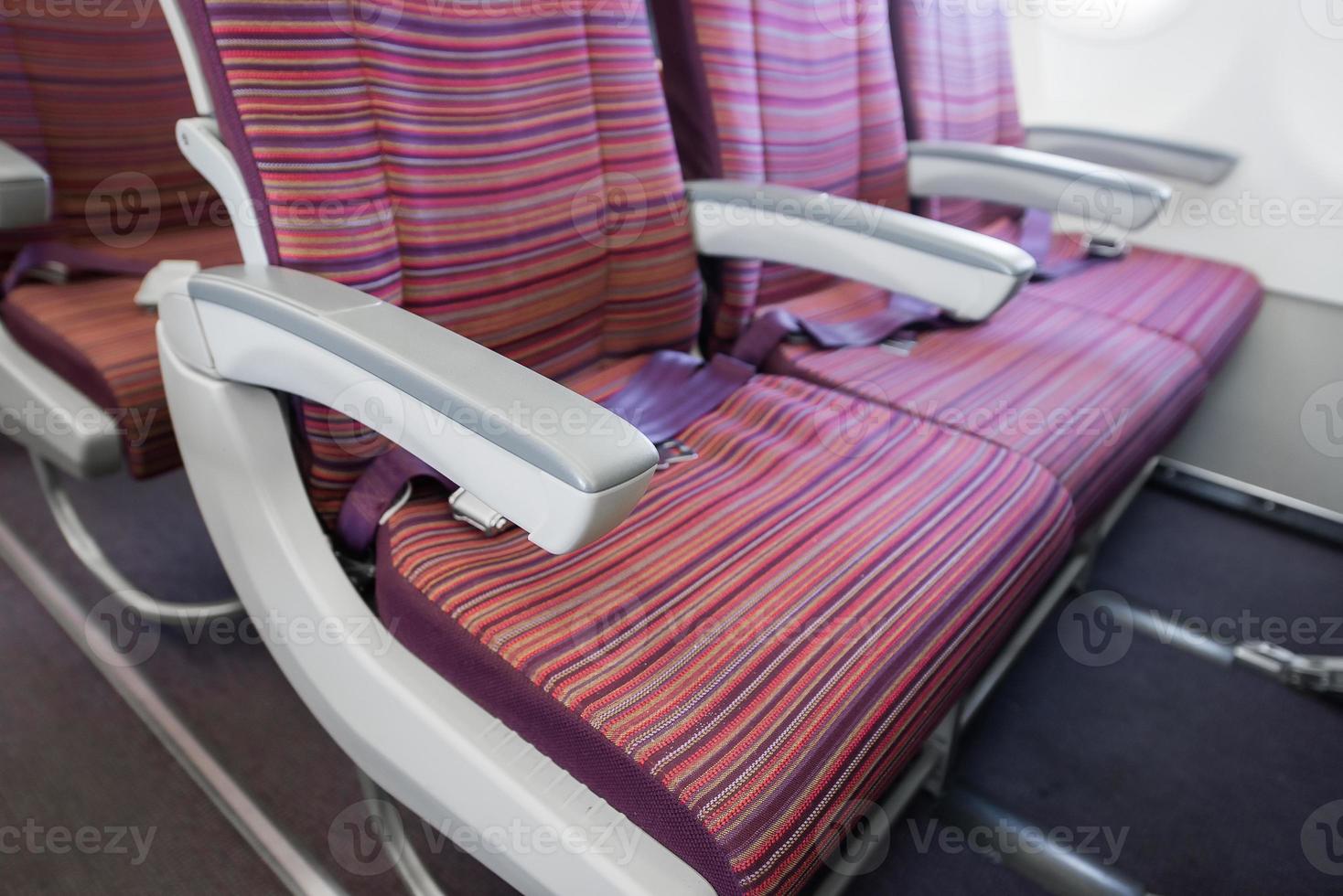 armchair and Empty airplane seats photo