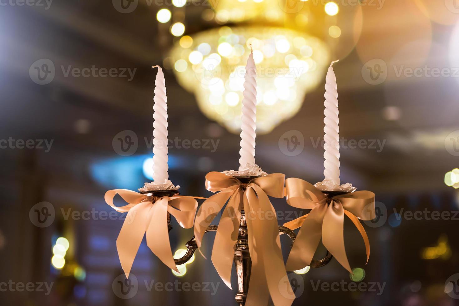 candlesticks with candles in ballroom photo