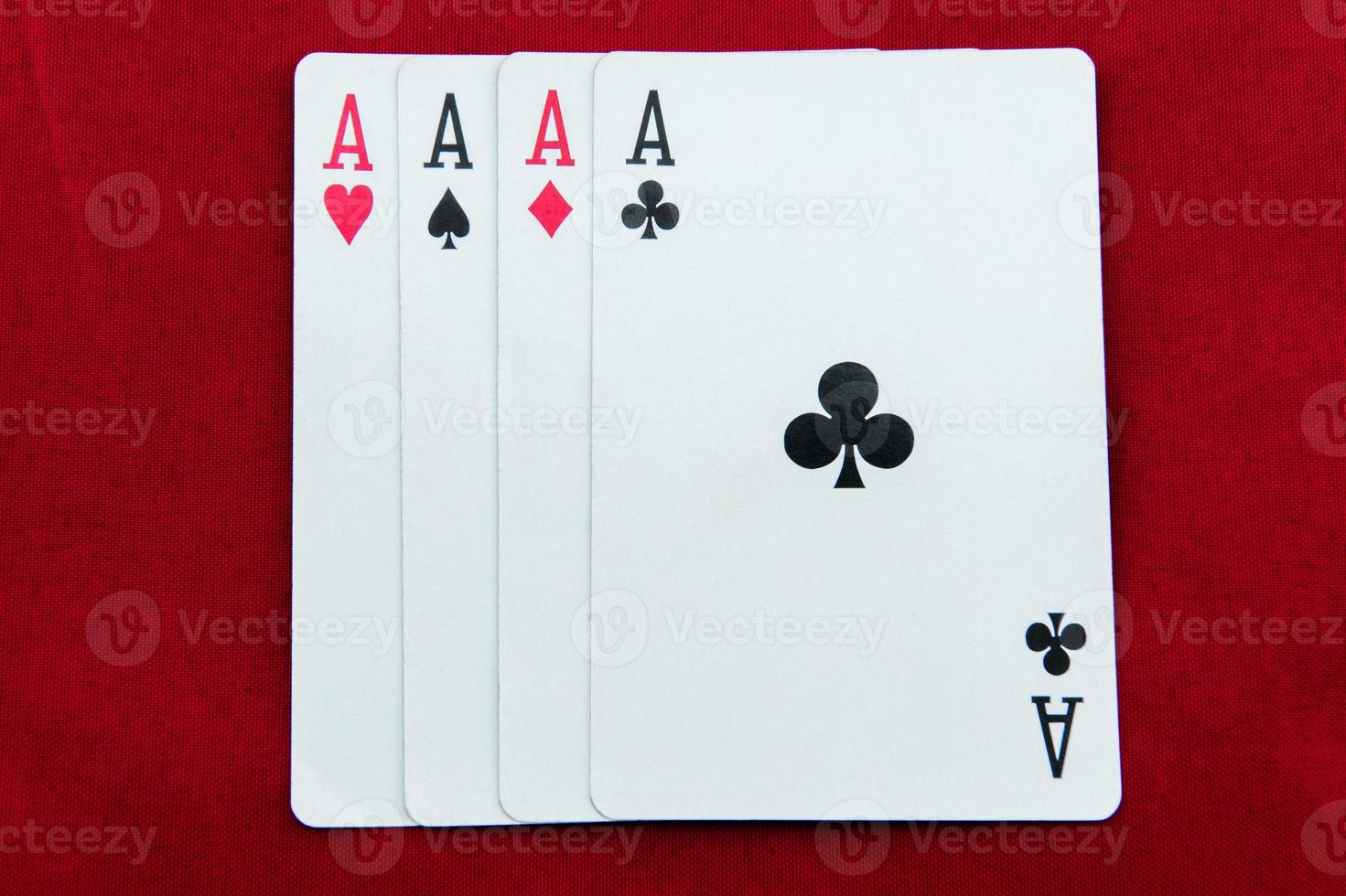 ACE-poker cards on red background photo